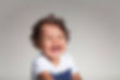 Baby with Curly Hair Laughing