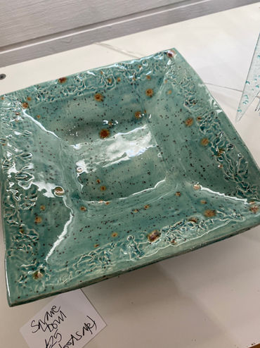 ceramic bowl blue green glaze textured rust coloured specks