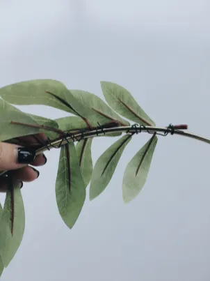 Image of attaching greenery to ring