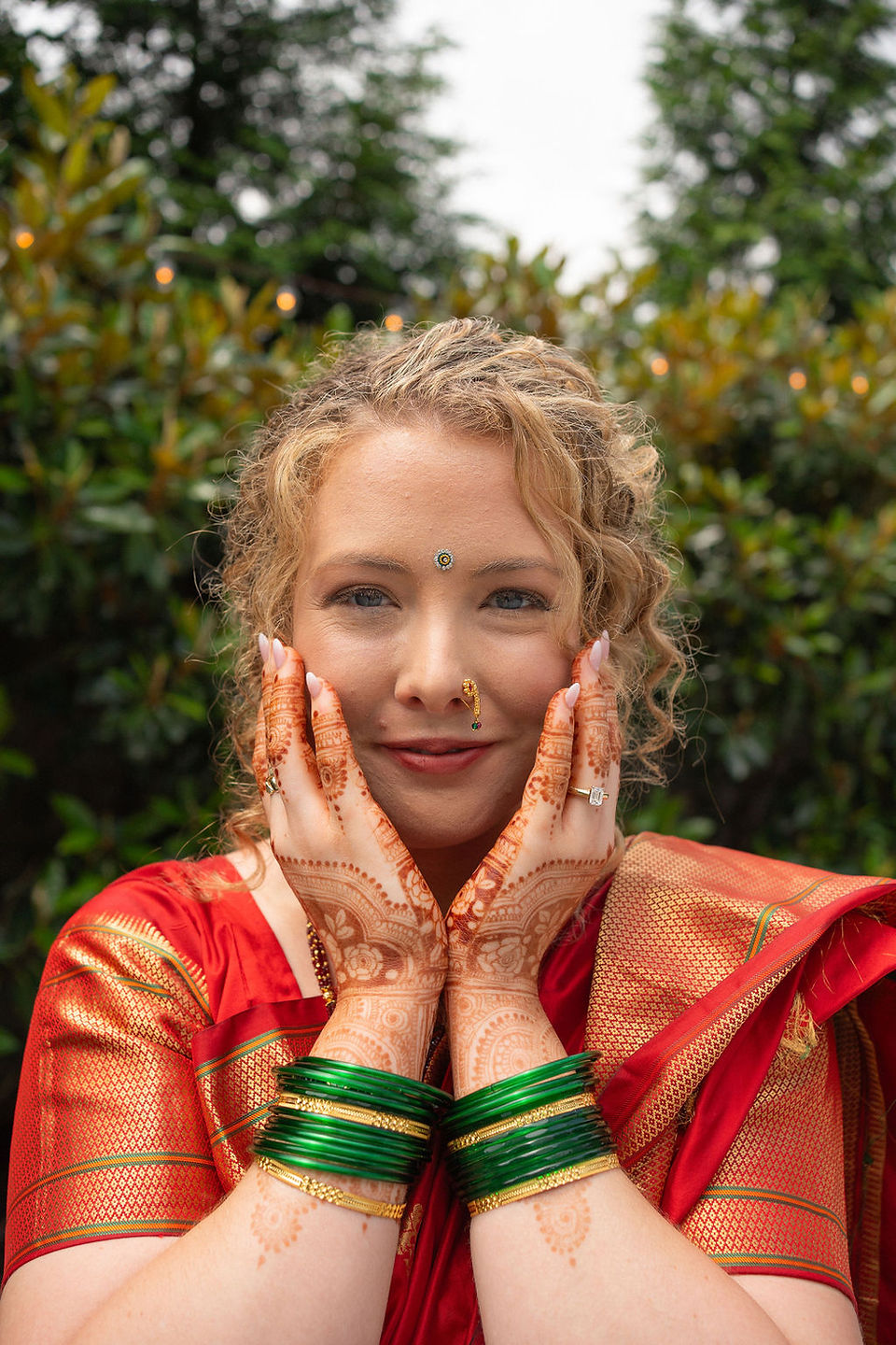 Bride in traditional Indian attire and henna