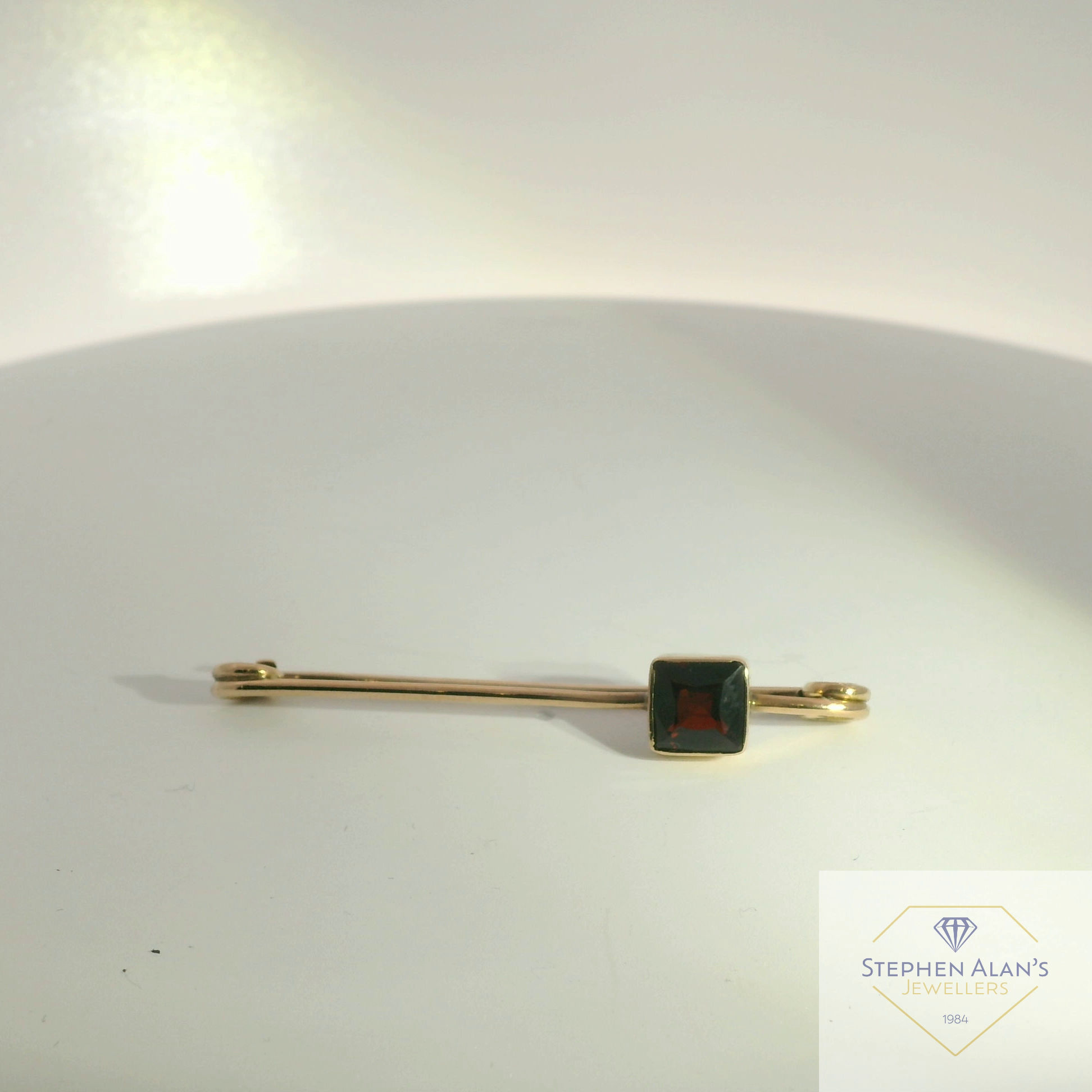 9ct garnet bar brooch