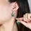 Thumbnail: Exquisite Elegance of Green Pear Diamond Earrings with Side Stones