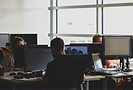 team working at computers in tech environment