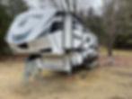picture of a momentum rv being inspected