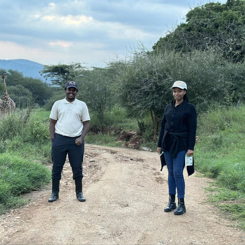 Wildlife vets Dr. David Murenzi and Dr. Charline Rutagengwa take a walk around Ol Jogi Conservancy in Kenya