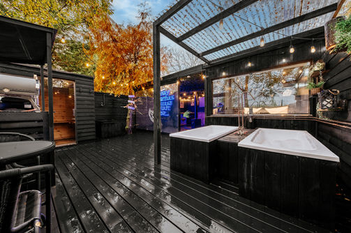 the mad house luxury glamping at wonderland retreats lancashire outdoor decking area