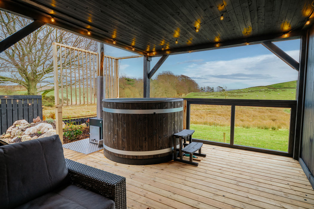 Private hot tub with breathtaking views at Cloud Nine Retreat, the perfect romantic staycation setting.