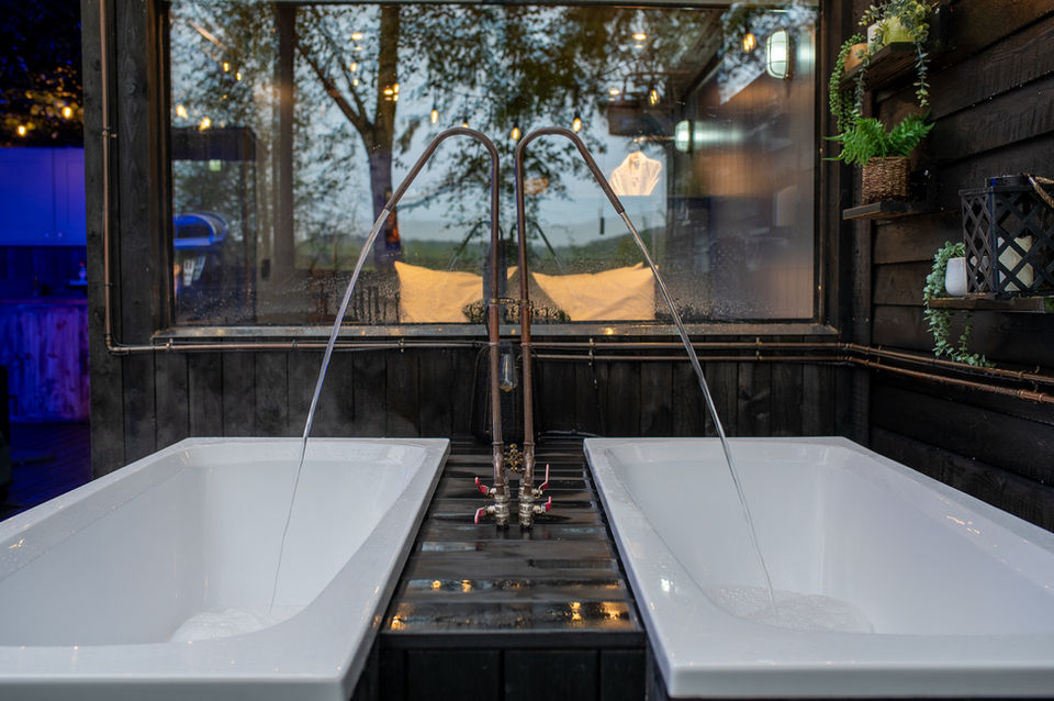 the mad house luxury glamping at wonderland retreats lancashire outdoor pouring baths