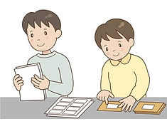 利用�者が弁当に貼るラベルを作成している様子
