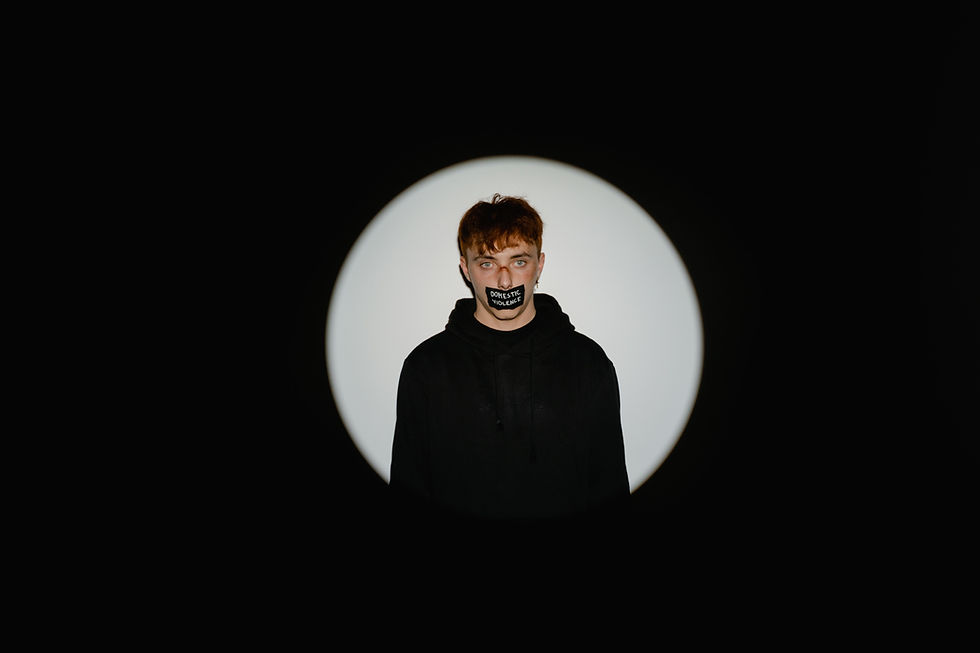 spotlight on a male domestic violence victim