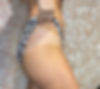 Woman with flawless bronzed tan from professional airbrush session