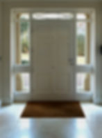 the front door of the cottage. Image taken from inside looking out