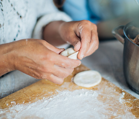 person-holding-dough-3893550.jpg