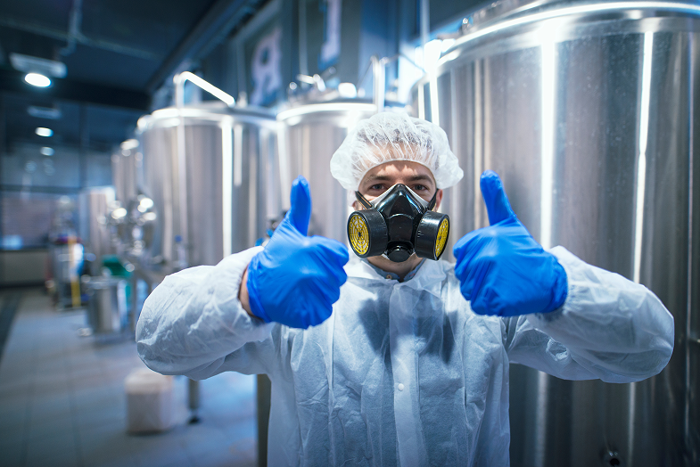 professional-technologist-expert-protective-white-uniform-with-hairnet-mask-gloves-holding