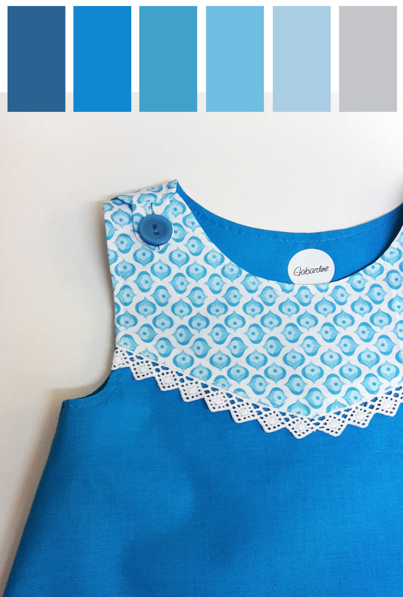 Robe bébé bleu glace et dentelle