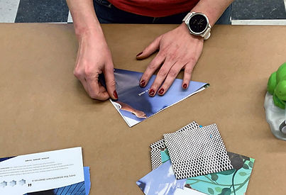 Paper Flowers Free Craft image of magazine squares folded in half to make a triangle