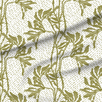 A slightly creased piece of fabric featuring an elegant duotone design of sea kelp fronds in a blockprint style.