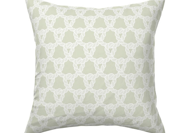 A slightly creased piece of fabric featuring interlocking white nautical rope loops on a sage green field by lenes_linien.