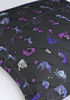 A slightly creased piece of fabric featuring a diagonal novelty design of peeping monsters by lenes_linien