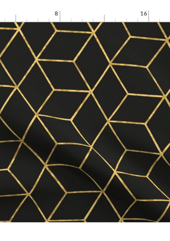 A slightly creased piece of fabric featuring a design of tesselating cubes forming a golden grid on black ground - by lenes_linien
