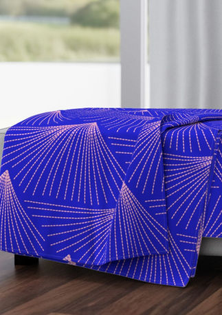 A slightly creased piece of fabric featuring abstract mountain-like shapes made of dashed lines by lenes_linien.