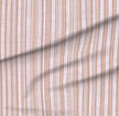 A slightly creased piece of fabric featuring irregular painted vertical stripes in soft peach and ivory by lenes_linien.