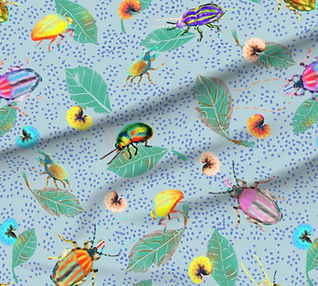 A slightly creased rectangle of fabric showing colorful bugs against muted light blue background structured by light blue clustered dots.