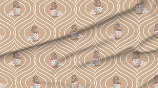 A slightly creased piece of fabric featuring baby bunnies sitting in easter egg shells, sticking out their tongues.