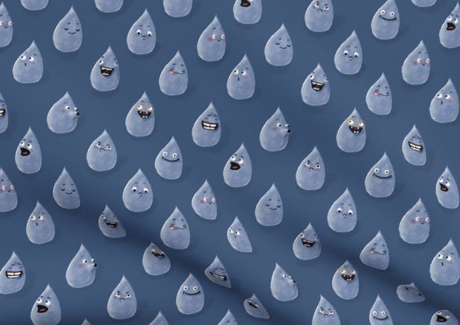 A slightly creased piece of fabric showing a gender-neutral design of raindrop characters with funny faces in light blue on dark blue.