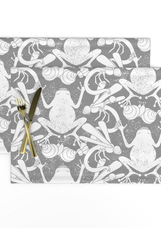 A slightly creased piece of fabric showing an art nouveau inspired frog pond design with fluid lines by lenes_linien