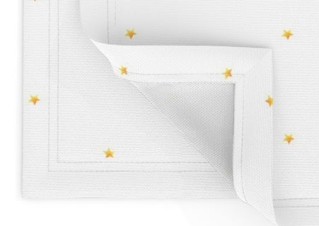 A slightly creased piece of fabric featuring tiny golden yellow stars scattered on a white ground by lenes_linien.
