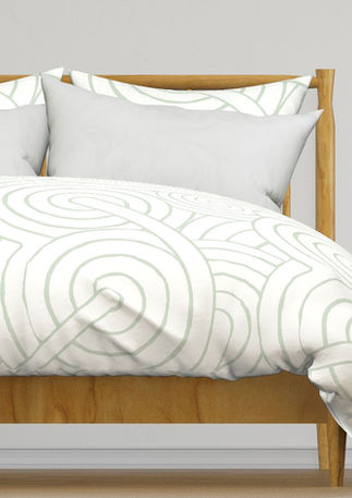 A slightly creased piece of fabric featuring a design of interlocking, sophisticated textured spirals by lenes_linien