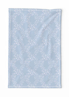 A slightly creased rectangle of fabric showing a trellis or lattice design of ogee-shaped clusters of pebbles on a unicolored background by lenes_linien.