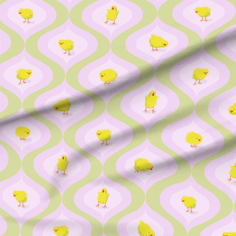 A slightly creased piece of fabric featuring yellow chicks in colorful retro ogee shapes by lenes_linien.