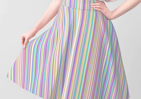A slightly creased piece of fabric featuring colorful irregular stripes by lenes_linien.