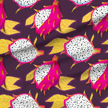 A slightly creased piece of fabric featuring the described tropical fruit design.