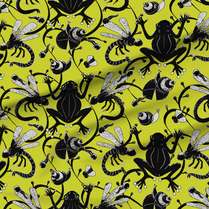 A slightly creased piece of fabric showing an art nouveau inspired frog pond design with fluid lines by lenes_linien
