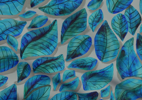 A slightly creased piece of fabric featuring a design of fallen, veined leaves hand-drawn by lenes_linien