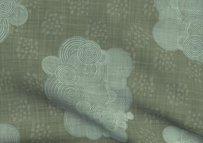 A slightly creased piece of fabric featuring a design of antique scrolls or spirals and clustered dots on jade green, textured faux-linen ground by lenes_linien