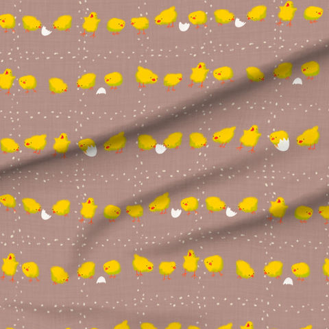 A slightly creased piece of fabric featuring a design of yellow tiny chicklets picking a grid formed of kernels by lenes_linien