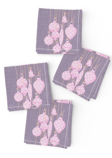 A slightly creased piece of fabric featuring xmas ornaments hanging from strings by lenes_linien.
