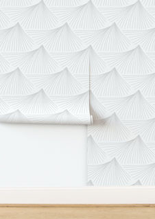 A slightly creased piece of fabric featuring abstract faux sashiko mountaintops in white and soft gray by lenes_linien.