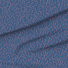 A slightly creased piece of fabric featuring scattered crescent shapes in dusty blue and pale coral pink by lenes_linien.