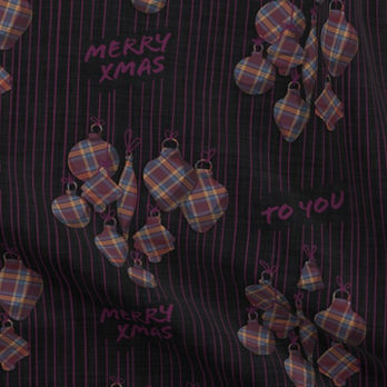 A slightly creased piece of fabric featuring xmas ornaments hanging from strings by lenes_linien.