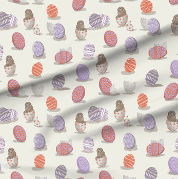 A slightly creased piece of fabric featuring the described easter bunny and egg shells design.