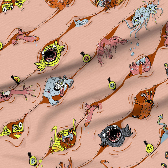 A slightly creased piece of fabric featuring a diagonal novelty design of peeping monsters by lenes_linien