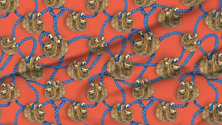 A slightly creased piece of fabric featuring the described design of hand-drawn sloths hanging on lianas.