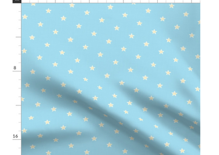 A slightly creased piece of fabric featuring a design of tiny gold glowing stars on muted blue faux linen texture by lenes_linien