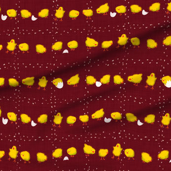 A slightly creased piece of fabric featuring a design of yellow tiny chicklets picking a grid formed of kernels by lenes_linien