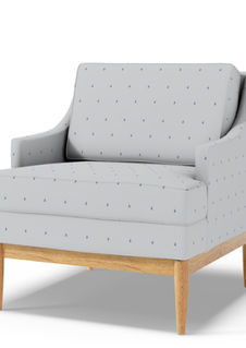A slightly creased piece of fabric featuring minimalist blue raindrops on a light gray ground by lenes_linien.